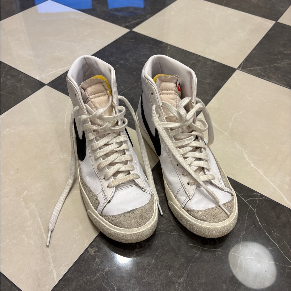 Nike White Sneakers with Black Logo